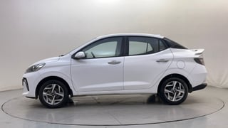 Used 2025 Hyundai Aura SX 1.2 (O) Petrol Petrol Manual exterior LEFT SIDE VIEW