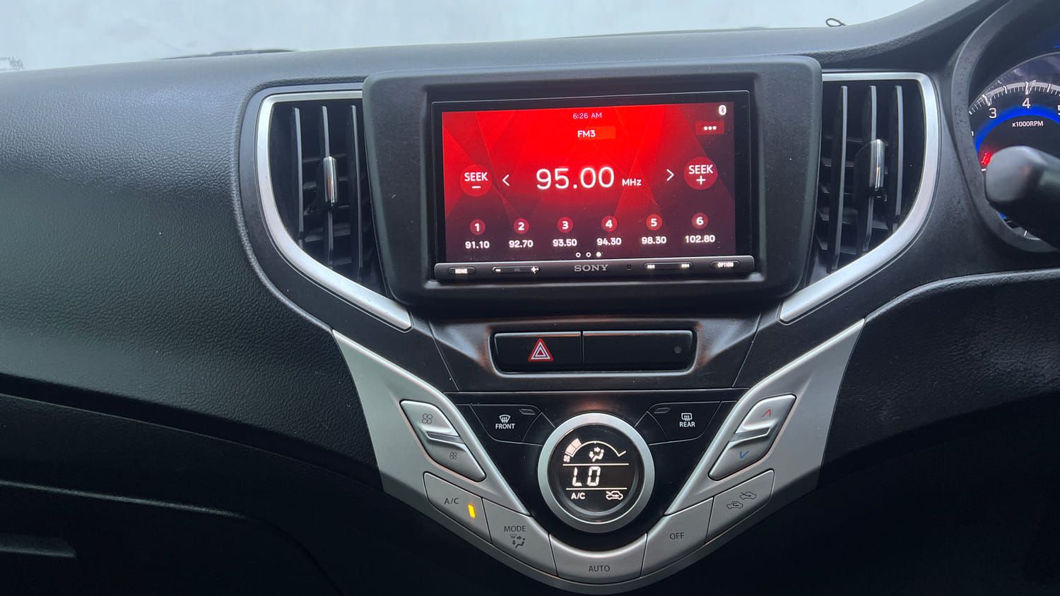 Used 2018 Maruti Suzuki Baleno Zeta 1.2 Petrol Manual interior MUSIC SYSTEM & AC CONTROL VIEW