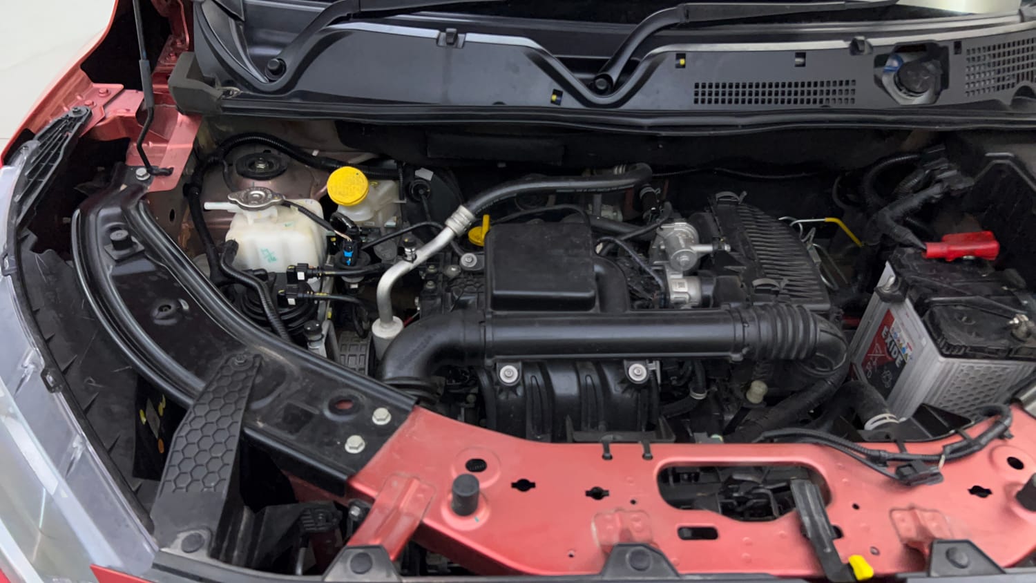 Used 2025 Nissan Magnite N-Connecta B4D 1.0 Petrol AMT Dual Tone Petrol Automatic engine ENGINE RIGHT SIDE VIEW