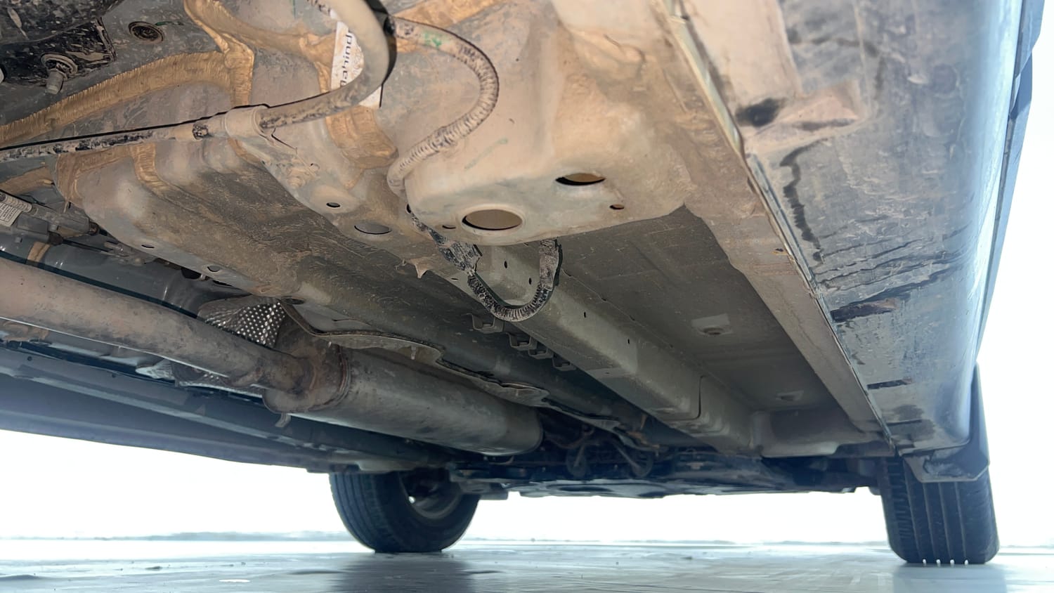 Used 2024 Mahindra XUV 3XO AX5 1.2 Petrol AT Petrol Automatic extra REAR RIGHT UNDERBODY VIEW