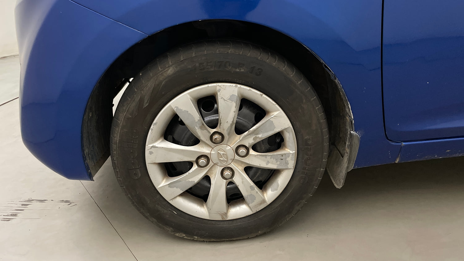 Used 2012 Hyundai Eon Sportz Petrol Manual tyres LEFT FRONT TYRE RIM VIEW
