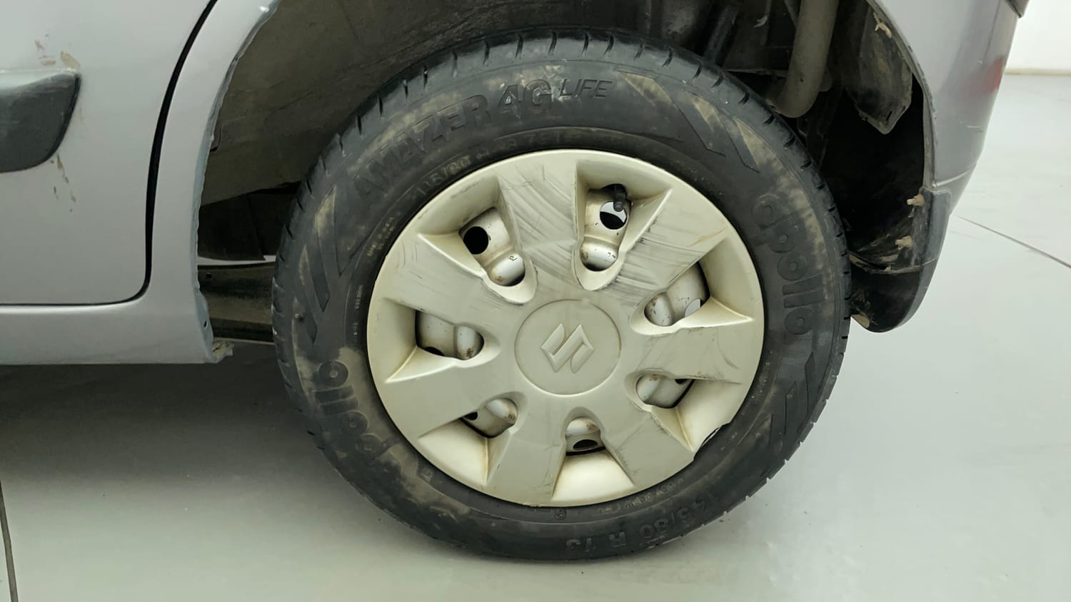 Used 2013 Maruti Suzuki Wagon R LXI Petrol Manual tyres LEFT REAR TYRE RIM VIEW
