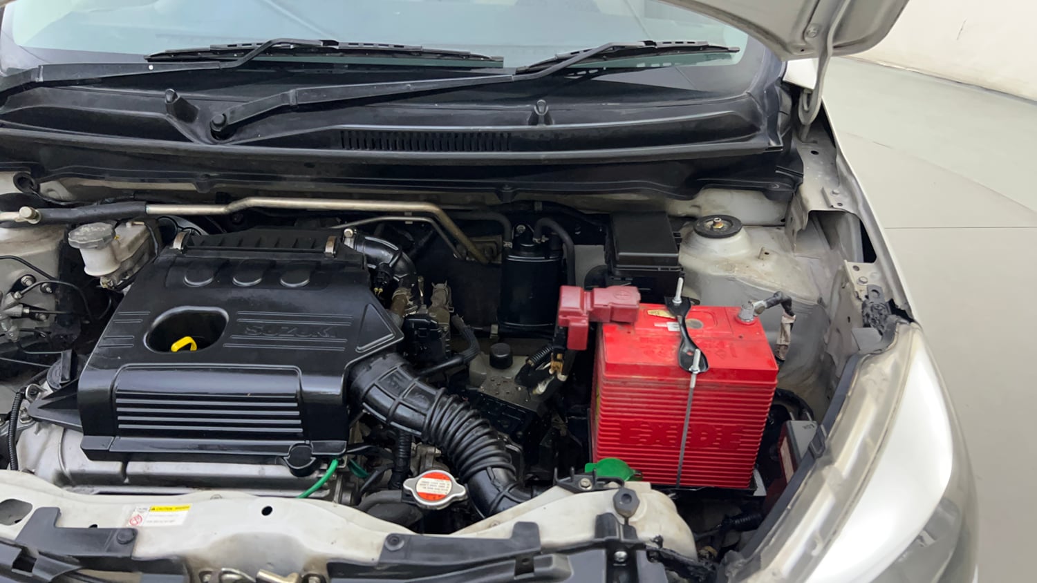 Used 2016 Maruti Suzuki Celerio ZXi AMT Petrol Automatic engine ENGINE LEFT SIDE HINGE & APRON VIEW