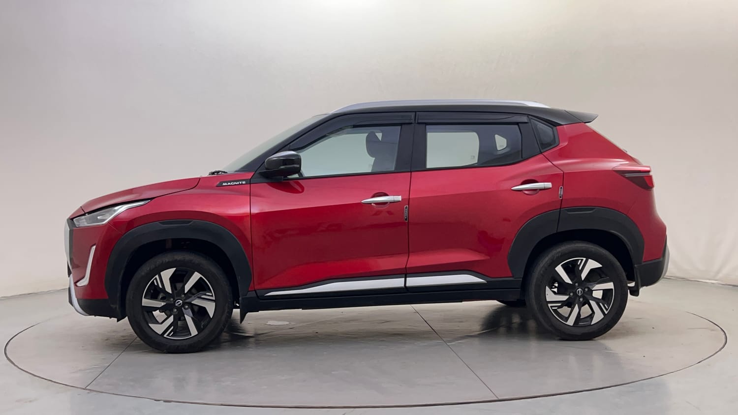 Used 2025 Nissan Magnite N-Connecta B4D 1.0 Petrol AMT Dual Tone Petrol Automatic exterior LEFT SIDE VIEW