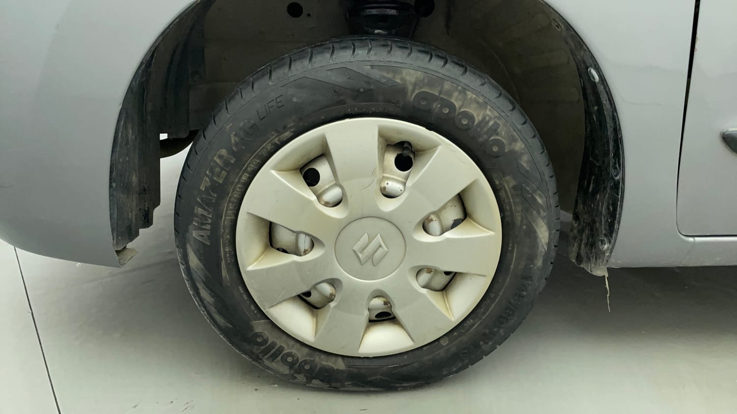 Used 2013 Maruti Suzuki Wagon R LXI Petrol Manual tyres LEFT FRONT TYRE RIM VIEW