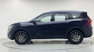 Used 2024 Mahindra XUV700 AX7 Luxury Pack Petrol AT 7 STR Petrol Automatic exterior LEFT SIDE VIEW