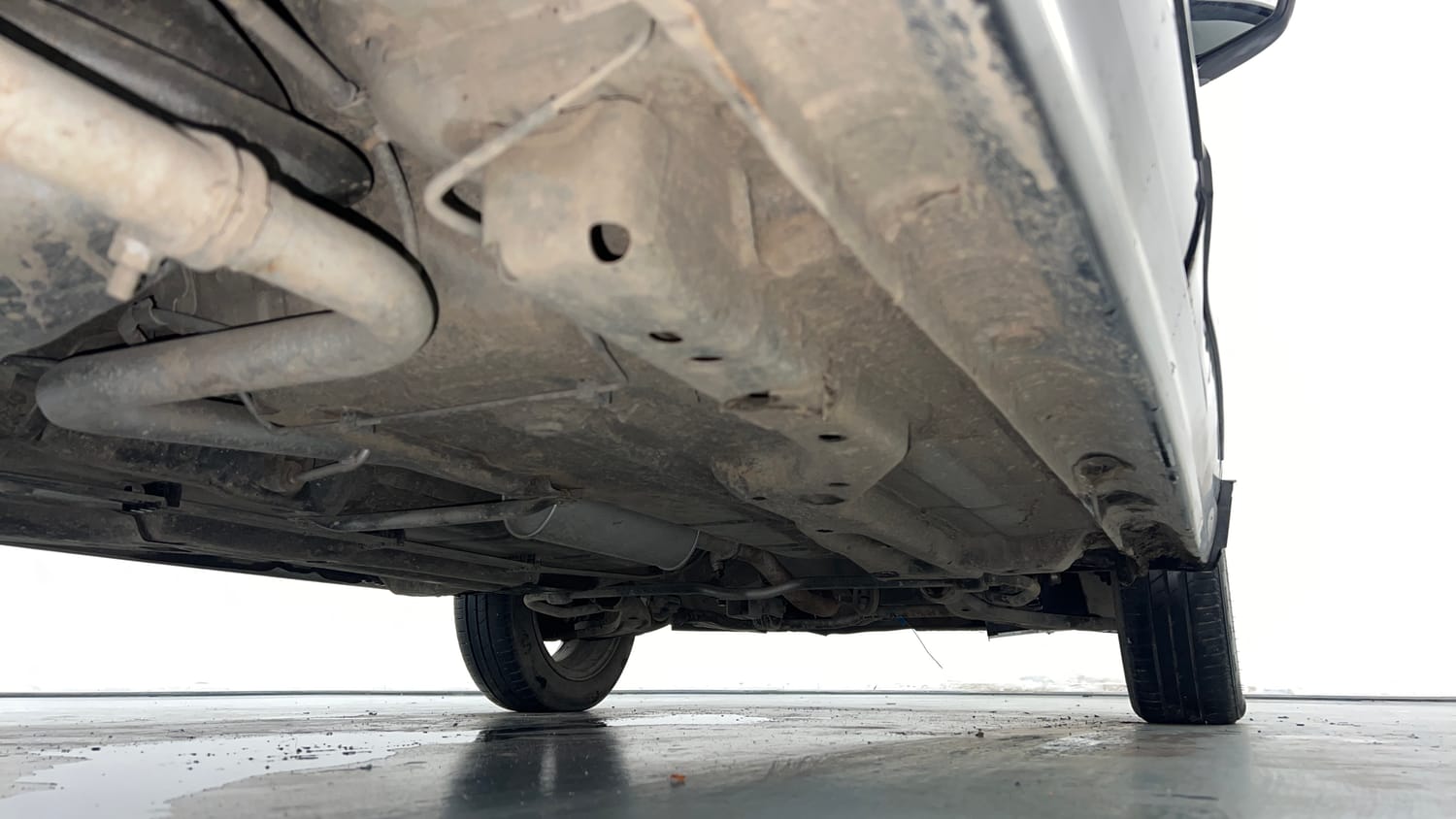 Used 2019 Tata Tigor Revotron XZ+ Petrol Manual extra REAR RIGHT UNDERBODY VIEW
