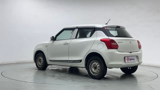 Used 2019 Maruti Suzuki Swift LXi Petrol Manual exterior LEFT REAR CORNER VIEW