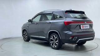 Used 2023 MG Motors Hector Plus Savvy Pro 1.5 Turbo Petrol CVT 7 STR Petrol Automatic exterior LEFT REAR CORNER VIEW