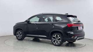Used 2023 MG Motors Hector Plus Savvy Pro 1.5 Turbo Petrol CVT 7 STR Petrol Automatic exterior LEFT REAR CORNER VIEW