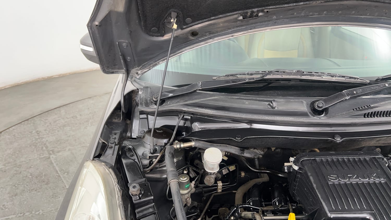 Used 2012 Maruti Suzuki Swift Dzire VXI Petrol Manual engine ENGINE RIGHT SIDE HINGE & APRON VIEW