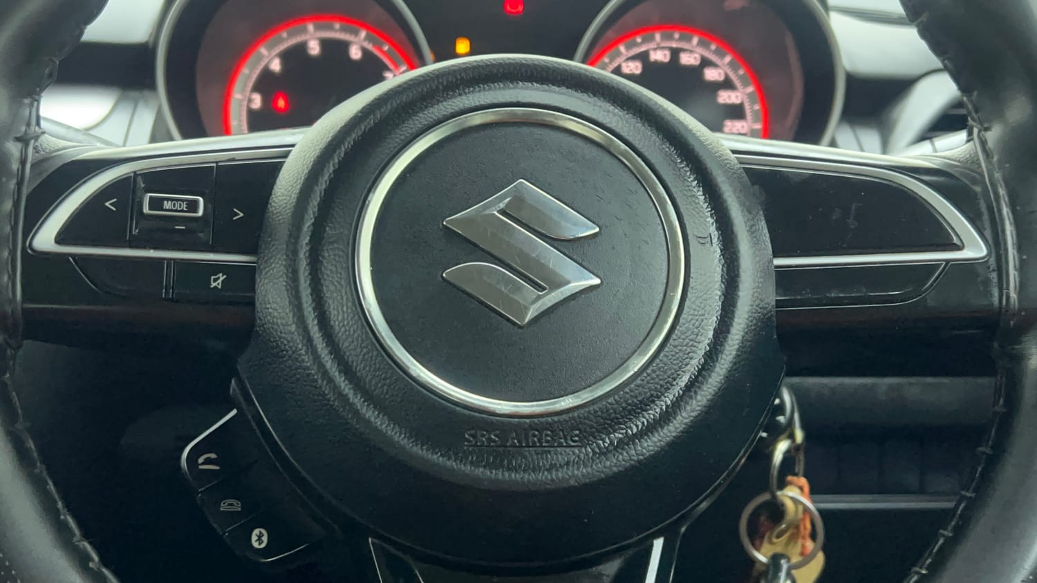 Used 2022 Maruti Suzuki Swift VXi Petrol Manual top_features Steering mounted controls