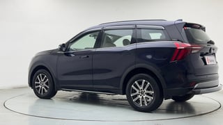 Used 2025 Mahindra XUV700 AX7 Petrol MT 7 STR Petrol Manual exterior LEFT REAR CORNER VIEW
