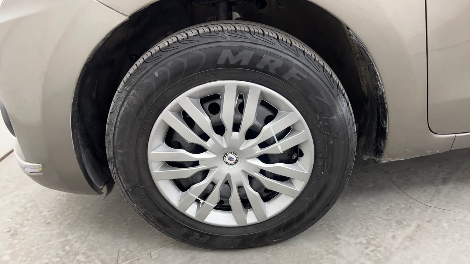 Used 2018 Maruti Suzuki Dzire VDi AMT Diesel Automatic tyres LEFT FRONT TYRE RIM VIEW