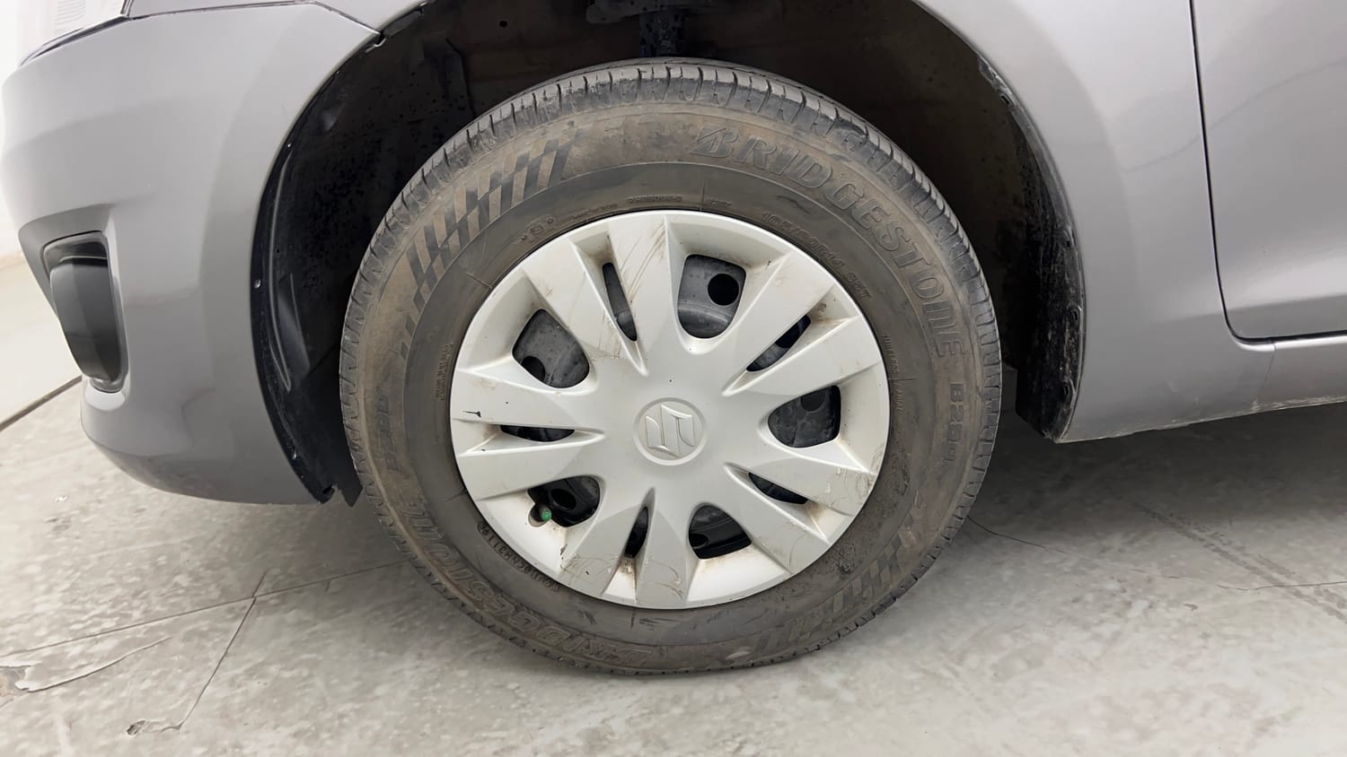 Used 2012 Maruti Suzuki Swift Dzire VXI Petrol Manual tyres LEFT FRONT TYRE RIM VIEW