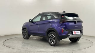 Used 2024 Tata Nexon Fearless Plus S Purple 1.2 Revotron Petrol 7DCA Dual Tone Petrol Automatic exterior LEFT REAR CORNER VIEW