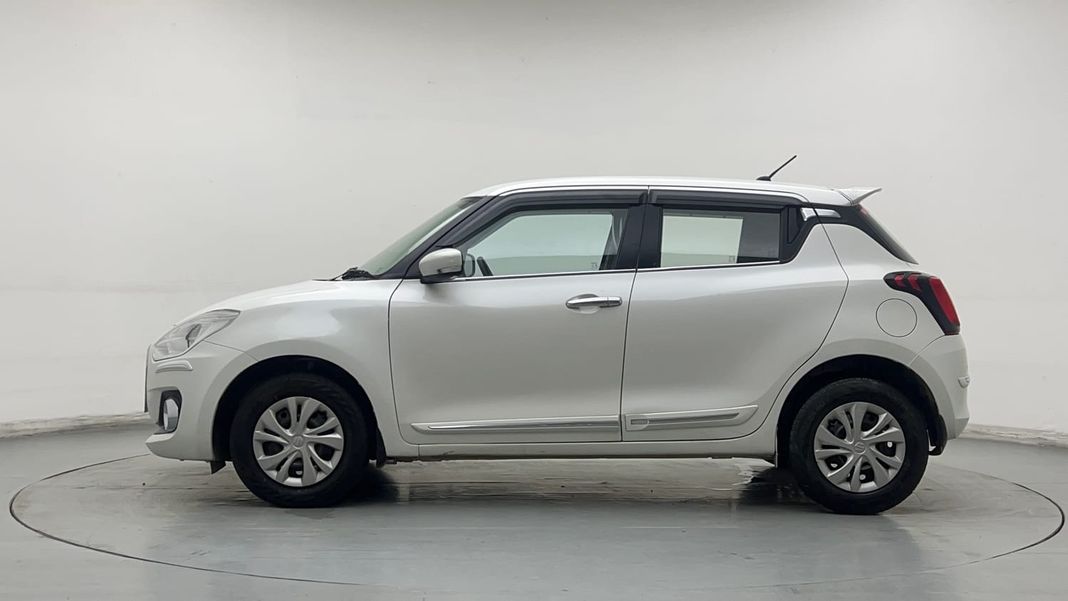 Used 2022 Maruti Suzuki Swift VXi Petrol Manual exterior LEFT SIDE VIEW