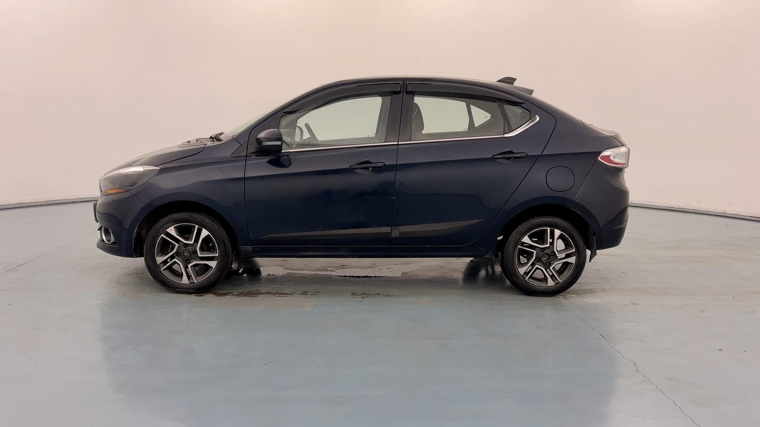 Used 2019 Tata Tigor Revotron XZ+ Petrol Manual exterior LEFT SIDE VIEW