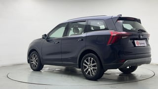 Used 2024 Mahindra XUV700 AX7 Luxury Pack Petrol AT 7 STR Petrol Automatic exterior LEFT REAR CORNER VIEW