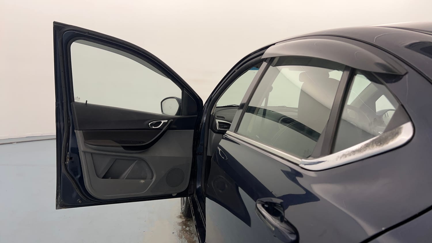 Used 2019 Tata Tigor Revotron XZ+ Petrol Manual interior LEFT FRONT DOOR OPEN VIEW