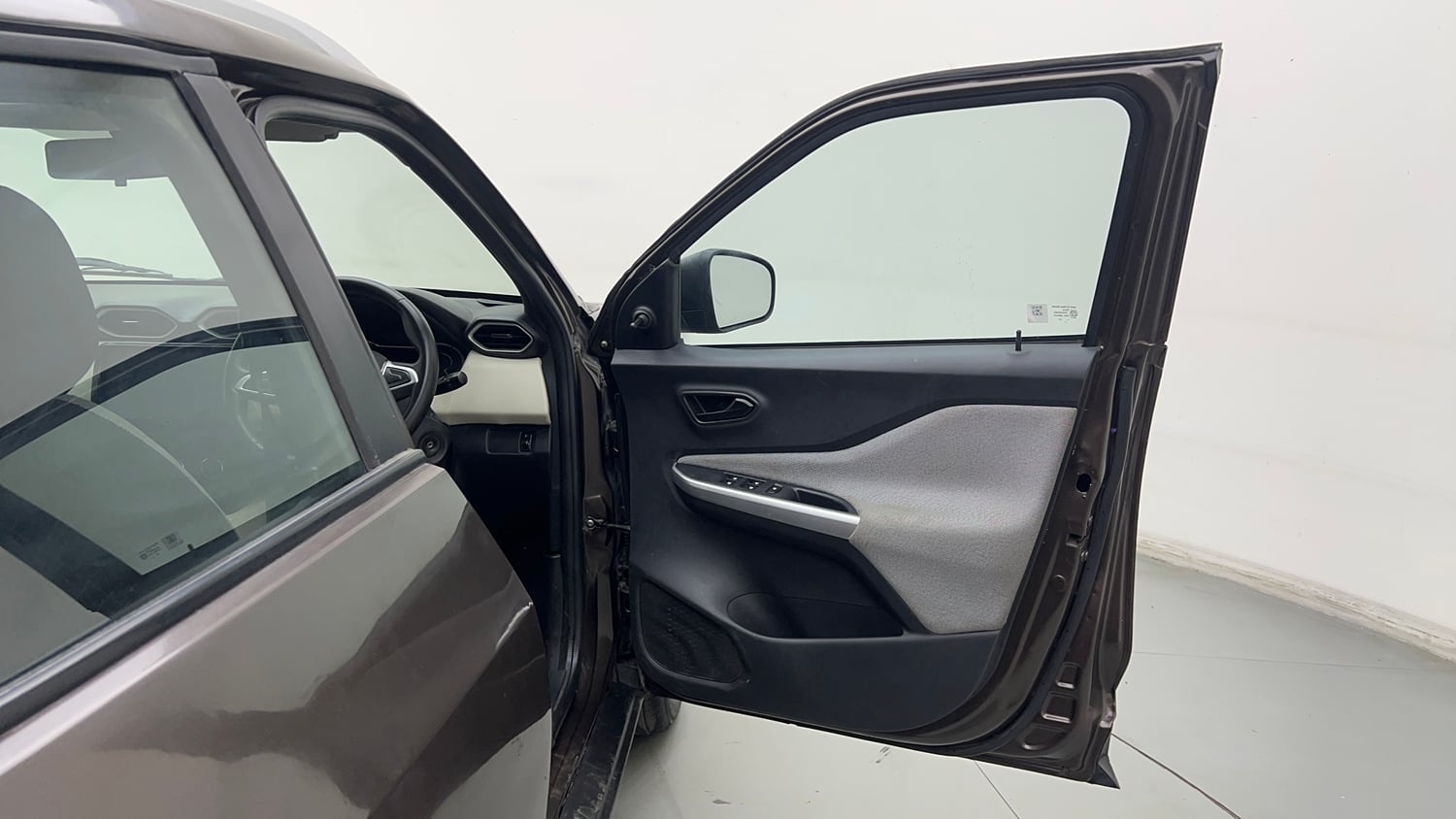 Used 2023 Nissan Magnite XE Petrol Manual interior RIGHT FRONT DOOR OPEN VIEW