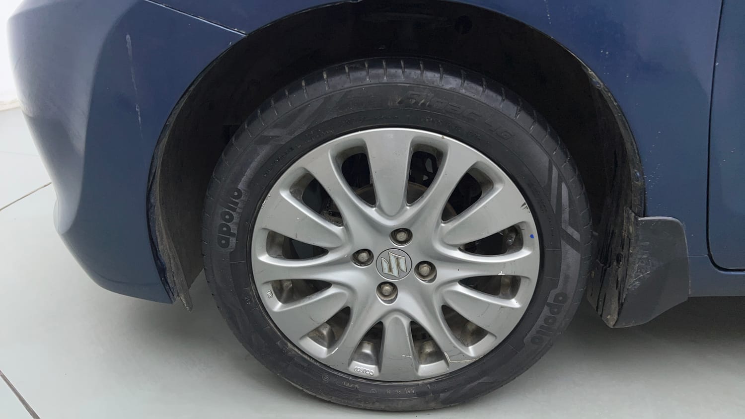 Used 2017 Maruti Suzuki Baleno Zeta 1.2 Petrol Manual tyres LEFT FRONT TYRE RIM VIEW