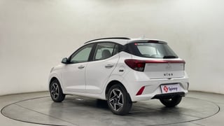 Used 2025 Hyundai Grand i10 Nios Asta 1.2 Kappa AMT Petrol Automatic exterior LEFT REAR CORNER VIEW