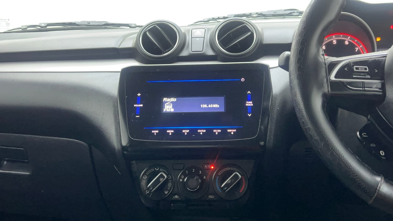 Used 2022 Maruti Suzuki Swift VXi Petrol Manual interior MUSIC SYSTEM & AC CONTROL VIEW