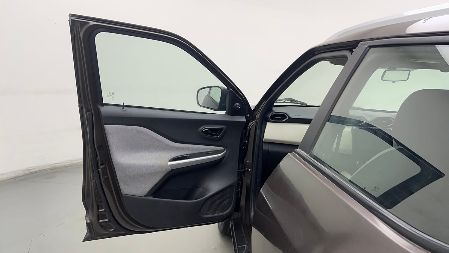 Used 2023 Nissan Magnite XE Petrol Manual interior LEFT FRONT DOOR OPEN VIEW