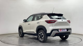 Used 2021 Nissan Magnite XV Premium Turbo (O) CVT Dual Tone Petrol Automatic exterior LEFT REAR CORNER VIEW