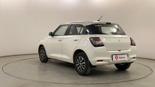 Used 2026 Maruti Suzuki Swift VXi AMT Petrol Automatic exterior LEFT REAR CORNER VIEW