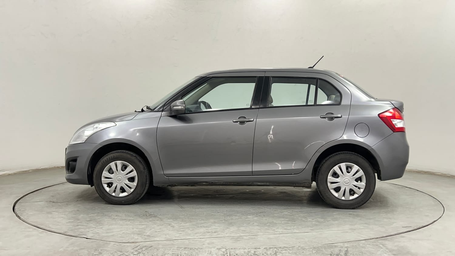 Used 2012 Maruti Suzuki Swift Dzire VXI Petrol Manual exterior LEFT SIDE VIEW