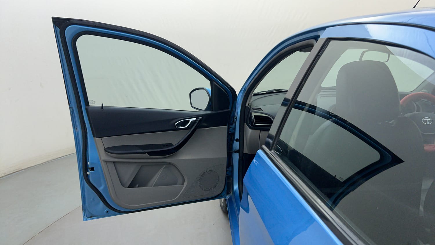 Used 2017 Tata Tiago Revotron XZ Petrol Manual interior LEFT FRONT DOOR OPEN VIEW