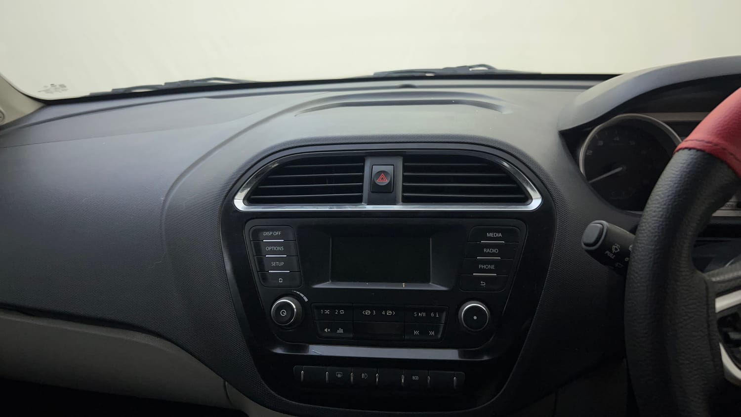Used 2017 Tata Tiago Revotron XZ Petrol Manual top_features Integrated (in-dash) music system