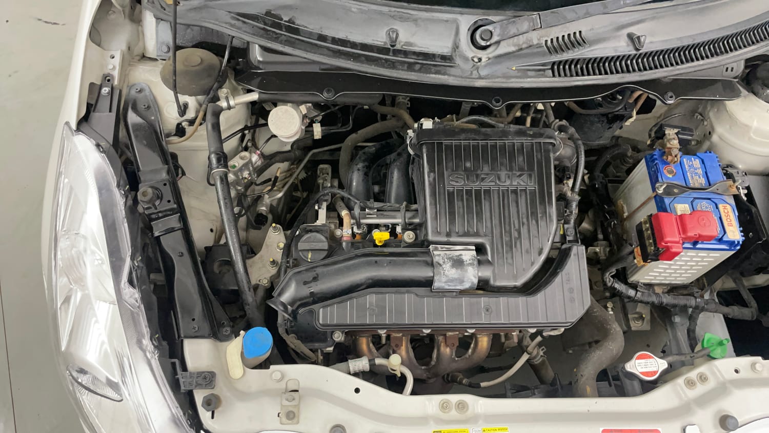 Used 2017 Maruti Suzuki Swift Lxi (O) Petrol Manual engine ENGINE RIGHT SIDE VIEW
