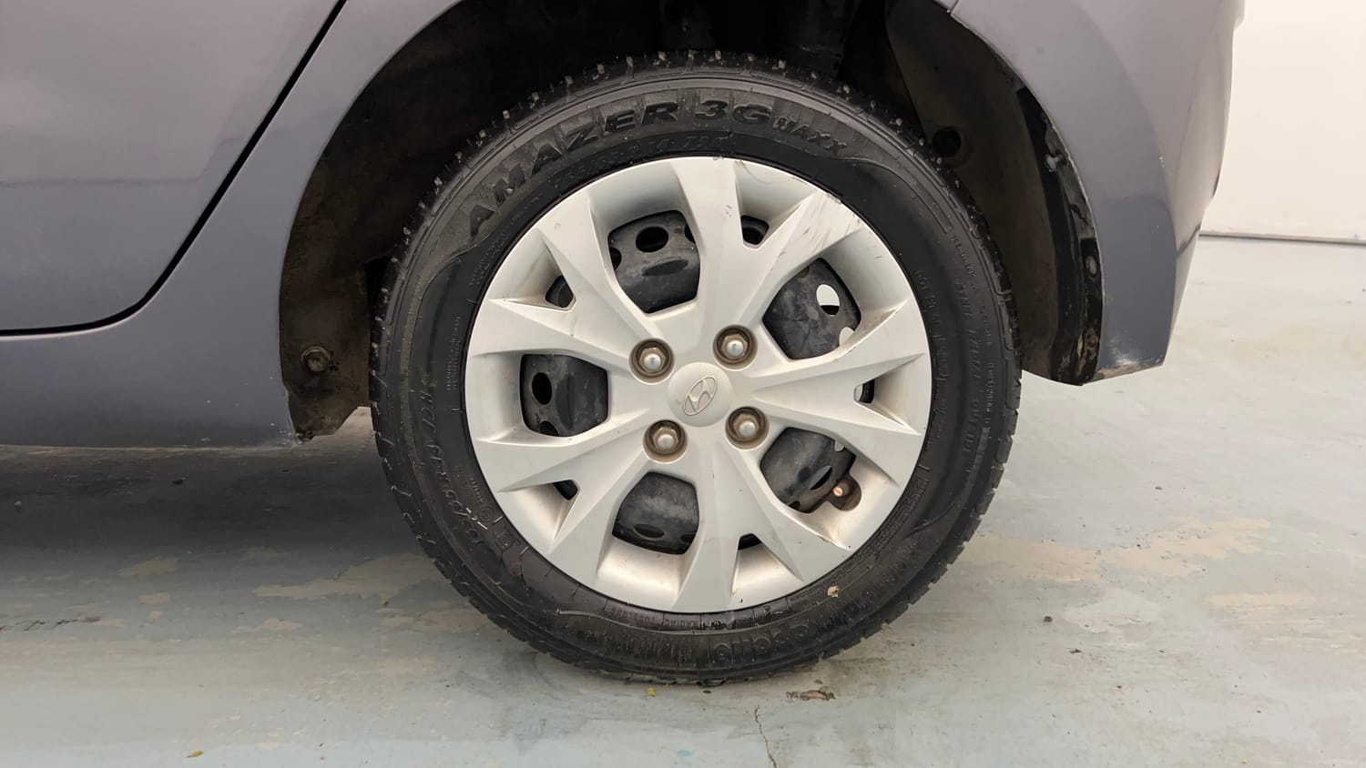 Used 2014 Hyundai Grand i10 Magna 1.2 Kappa VTVT Petrol Manual tyres LEFT REAR TYRE RIM VIEW