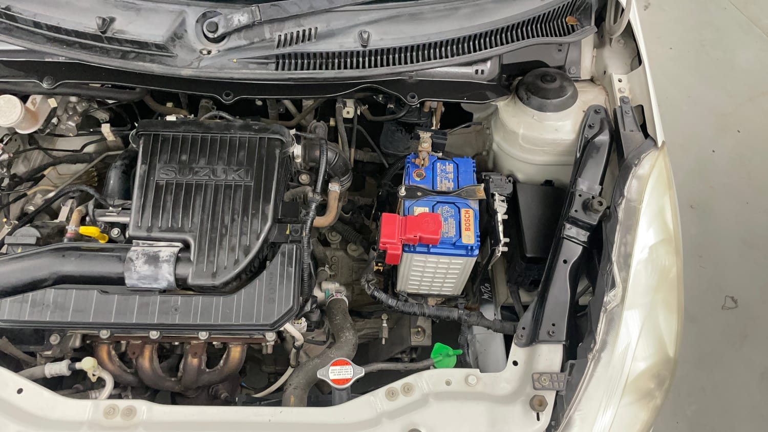 Used 2017 Maruti Suzuki Swift Lxi (O) Petrol Manual engine ENGINE LEFT SIDE VIEW