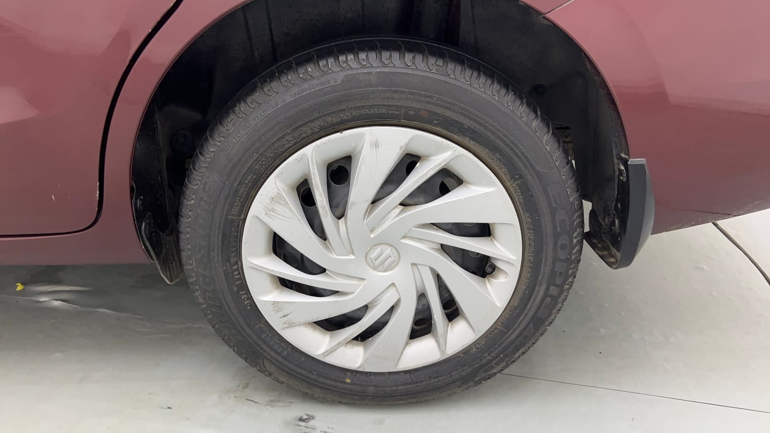 Used 2023 Maruti Suzuki Ertiga VXi (O) Petrol Manual tyres LEFT REAR TYRE RIM VIEW