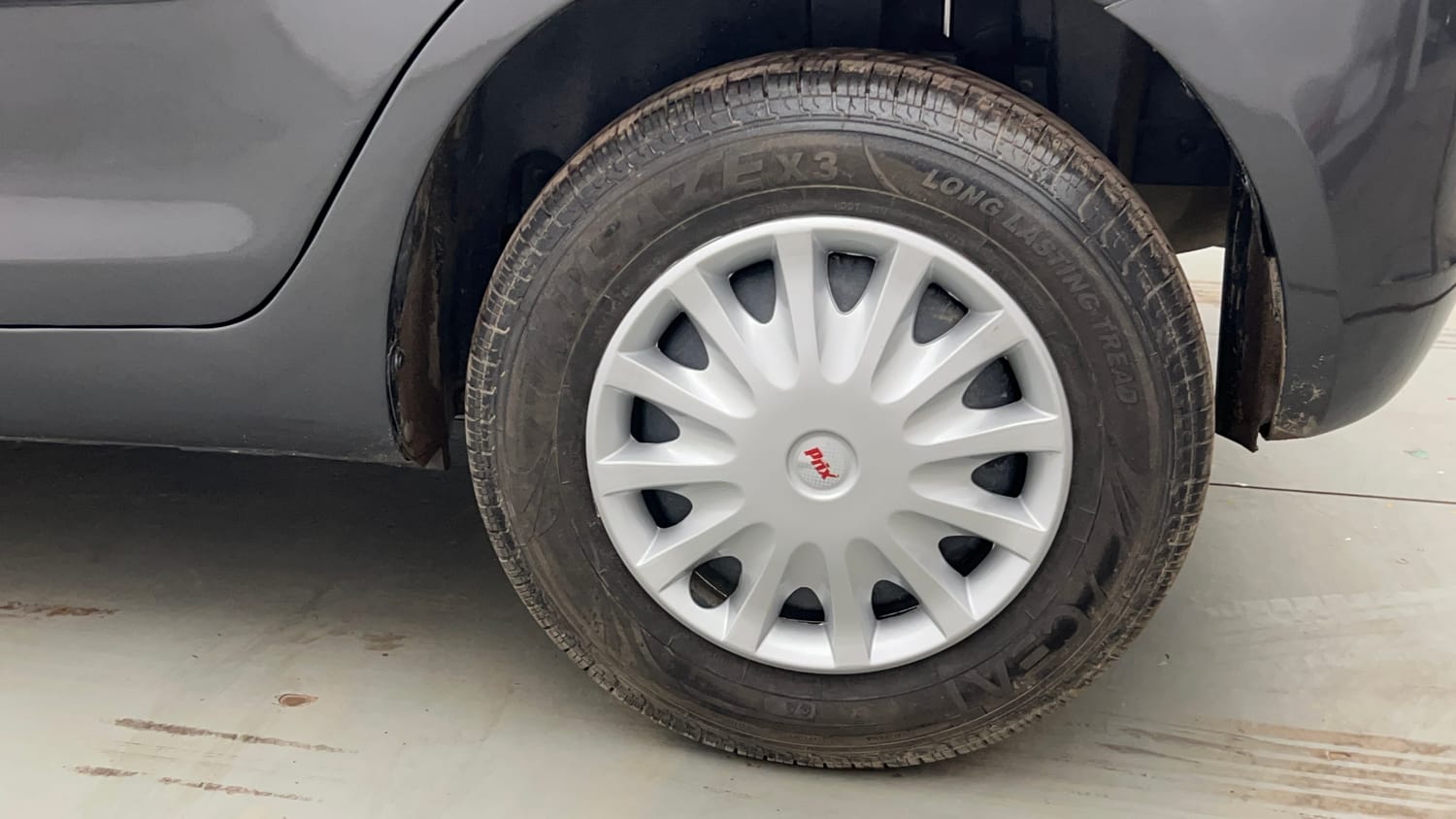 Used 2015 Maruti Suzuki Swift VXi Petrol Manual tyres LEFT REAR TYRE RIM VIEW