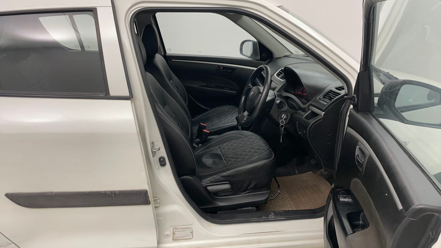 Used 2017 Maruti Suzuki Swift Lxi (O) Petrol Manual interior RIGHT SIDE FRONT DOOR CABIN VIEW