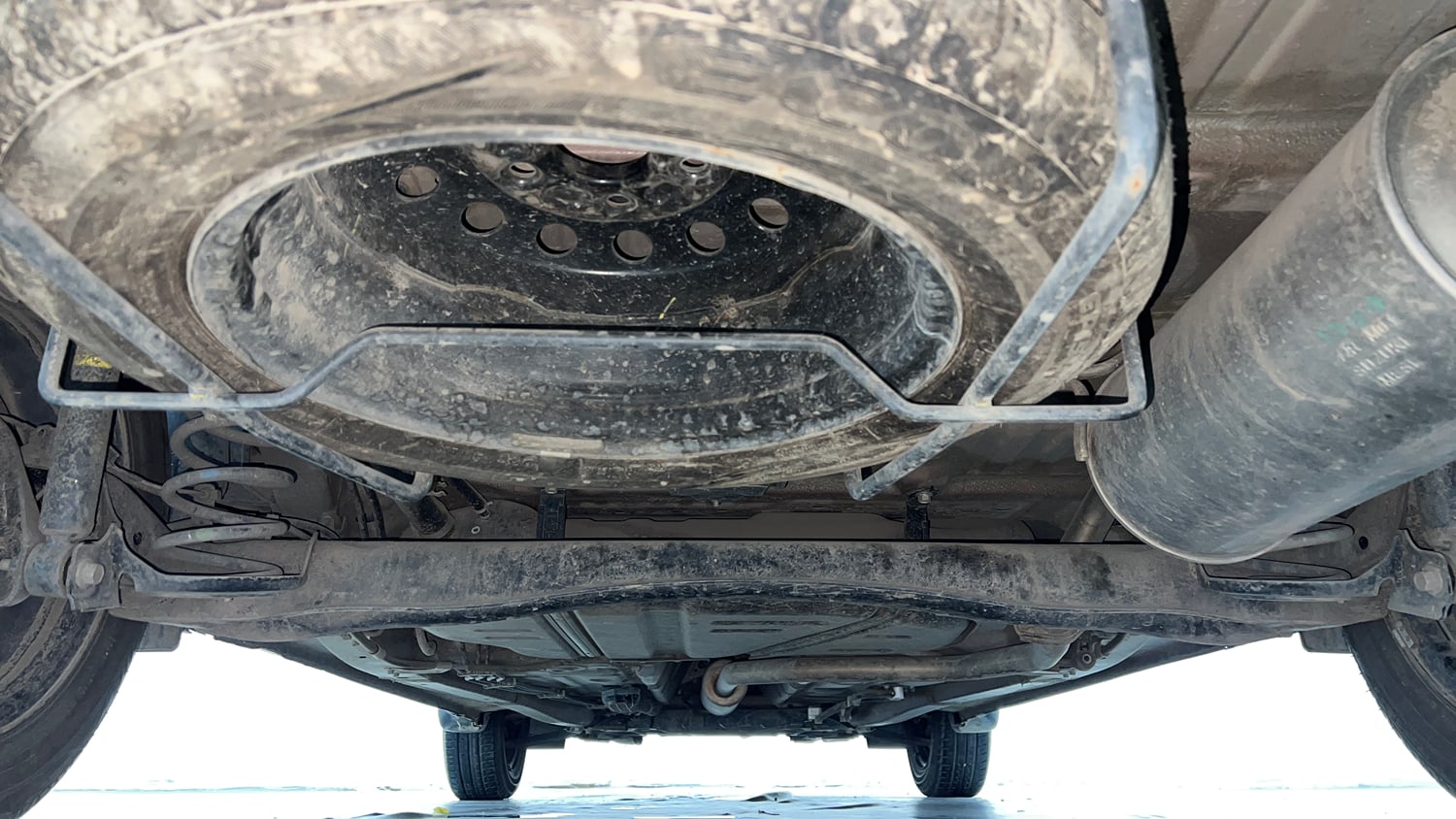 Used 2023 Maruti Suzuki Ertiga VXi (O) Petrol Manual extra REAR UNDERBODY VIEW (TAKEN FROM REAR)
