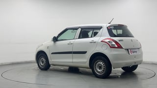 Used 2017 Maruti Suzuki Swift Lxi (O) Petrol Manual exterior LEFT REAR CORNER VIEW