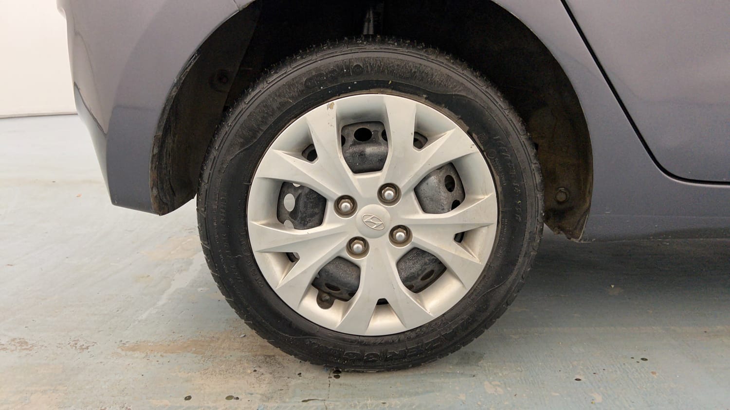 Used 2014 Hyundai Grand i10 Magna 1.2 Kappa VTVT Petrol Manual tyres RIGHT REAR TYRE RIM VIEW