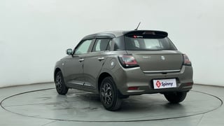 Used 2025 Maruti Suzuki Swift LXi Petrol Manual exterior LEFT REAR CORNER VIEW
