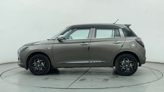 Used 2025 Maruti Suzuki Swift LXi Petrol Manual exterior LEFT SIDE VIEW