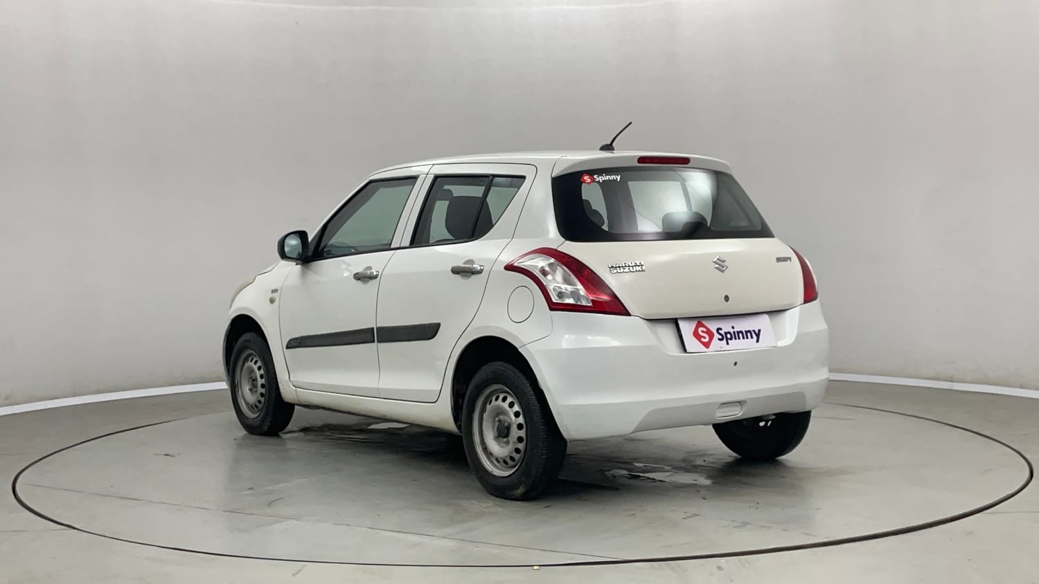 Used 2017 Maruti Suzuki Swift Lxi (O) Petrol Manual exterior LEFT REAR CORNER VIEW