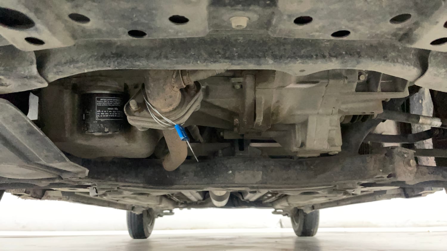 Used 2017 Maruti Suzuki Swift Lxi (O) Petrol Manual extra FRONT LEFT UNDERBODY VIEW