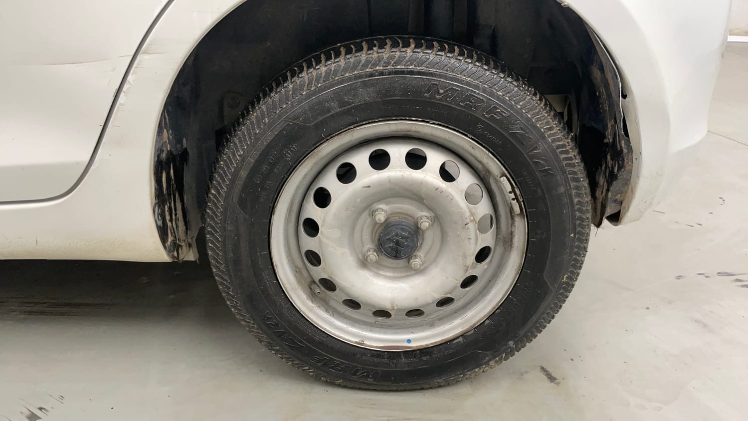 Used 2017 Maruti Suzuki Swift Lxi (O) Petrol Manual tyres LEFT REAR TYRE RIM VIEW