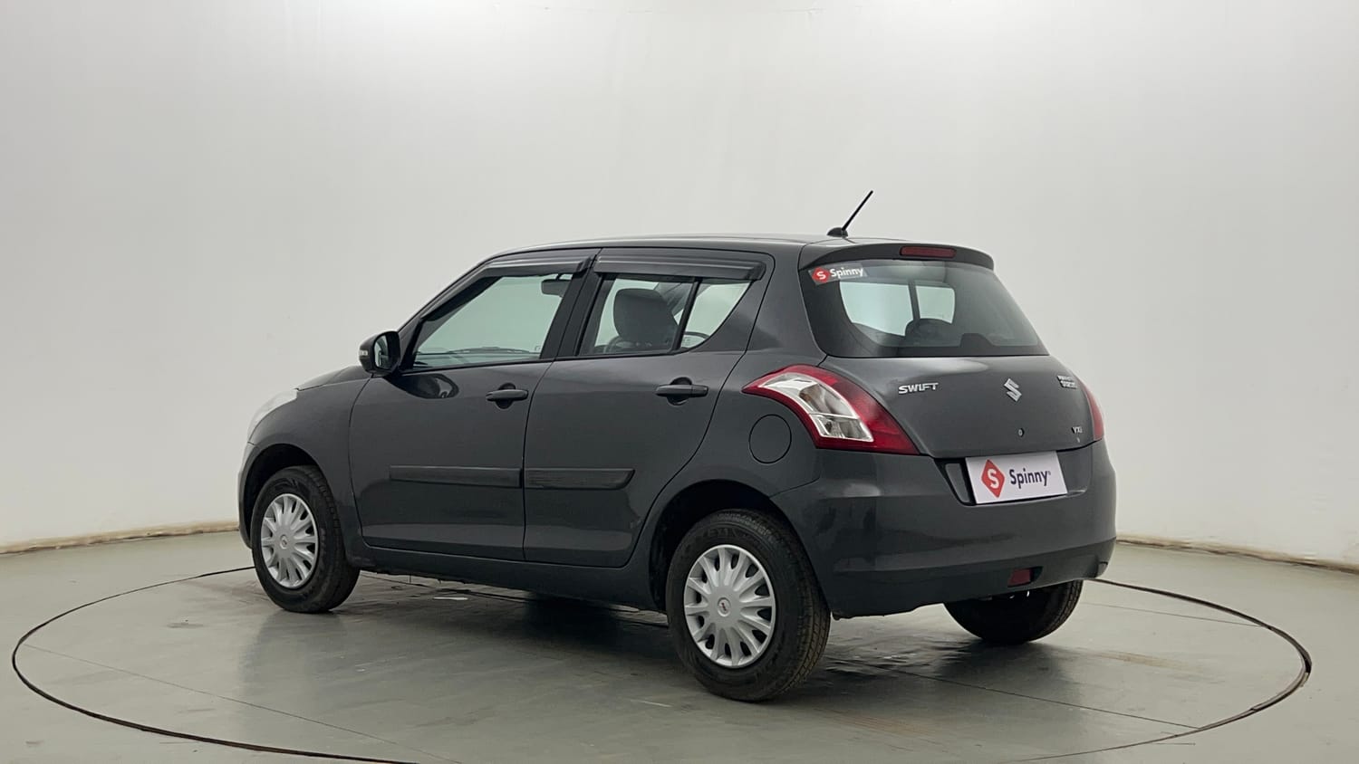 Used 2015 Maruti Suzuki Swift VXi Petrol Manual exterior LEFT REAR CORNER VIEW