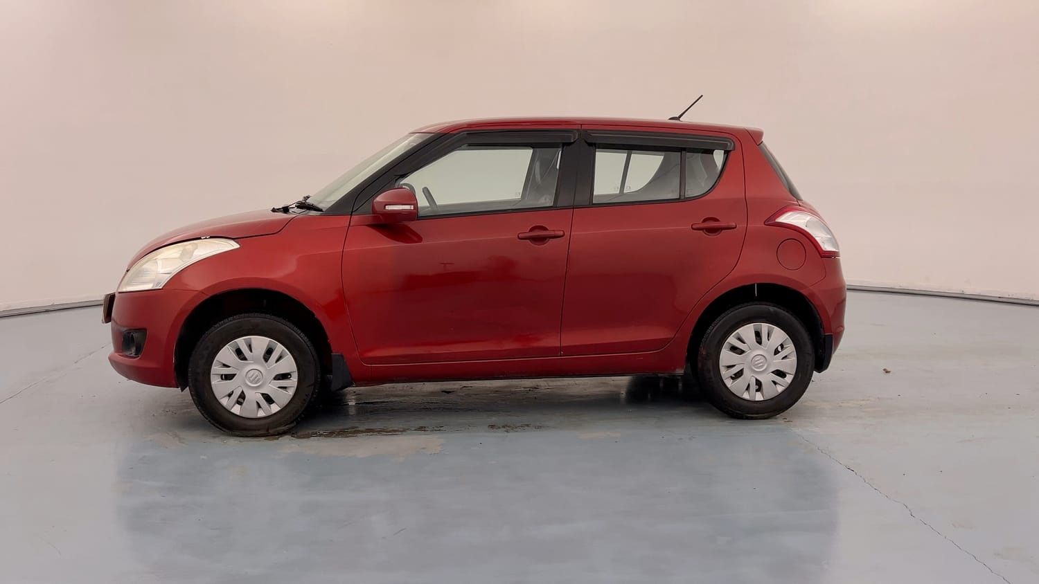 Used 2012 Maruti Suzuki Swift VXi Petrol Manual exterior LEFT SIDE VIEW